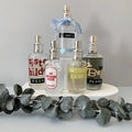 Perfume bottles from Pearfat perfume with visible graphics on a white background